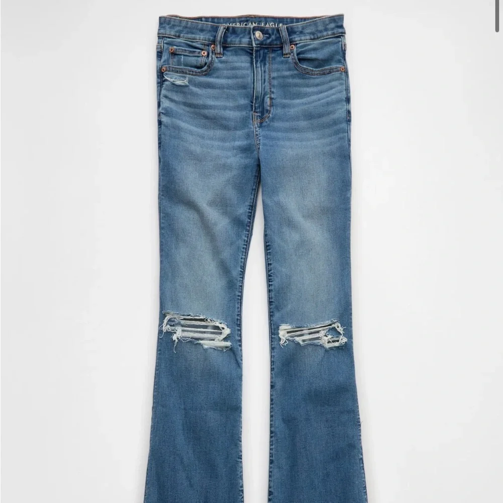 AE Next Level Super High-Waisted Ripped Flare Jean - Picture 2 of 6